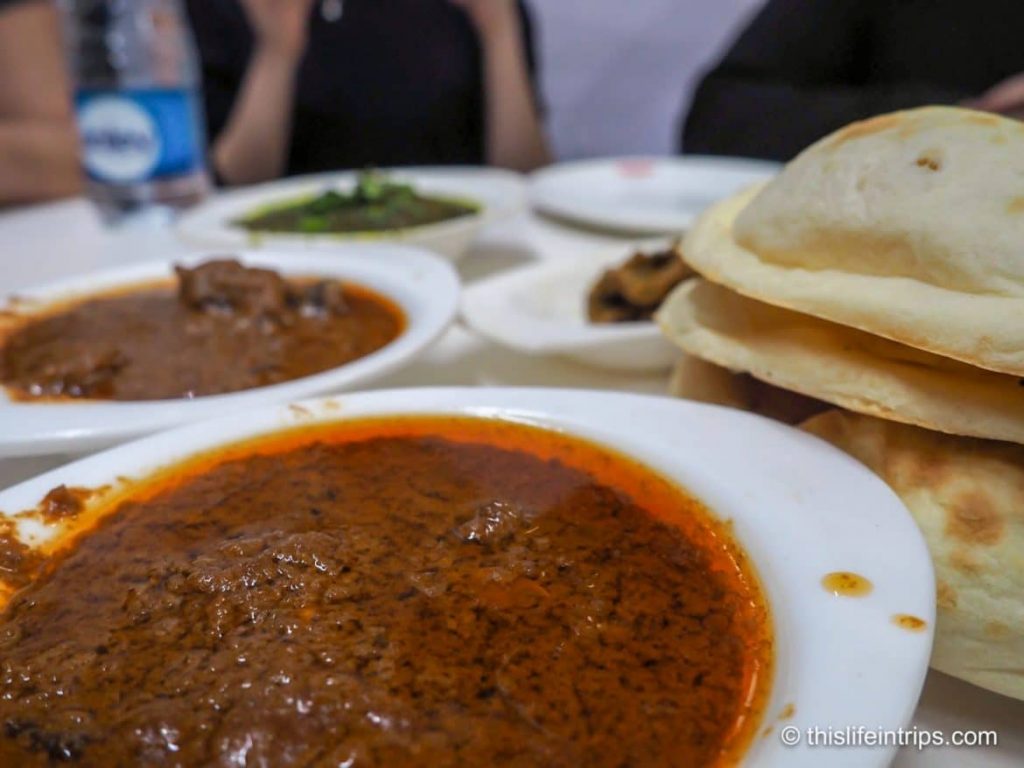 Treating our taste buds to the delicious combination of kebabs and curry in Delhi.