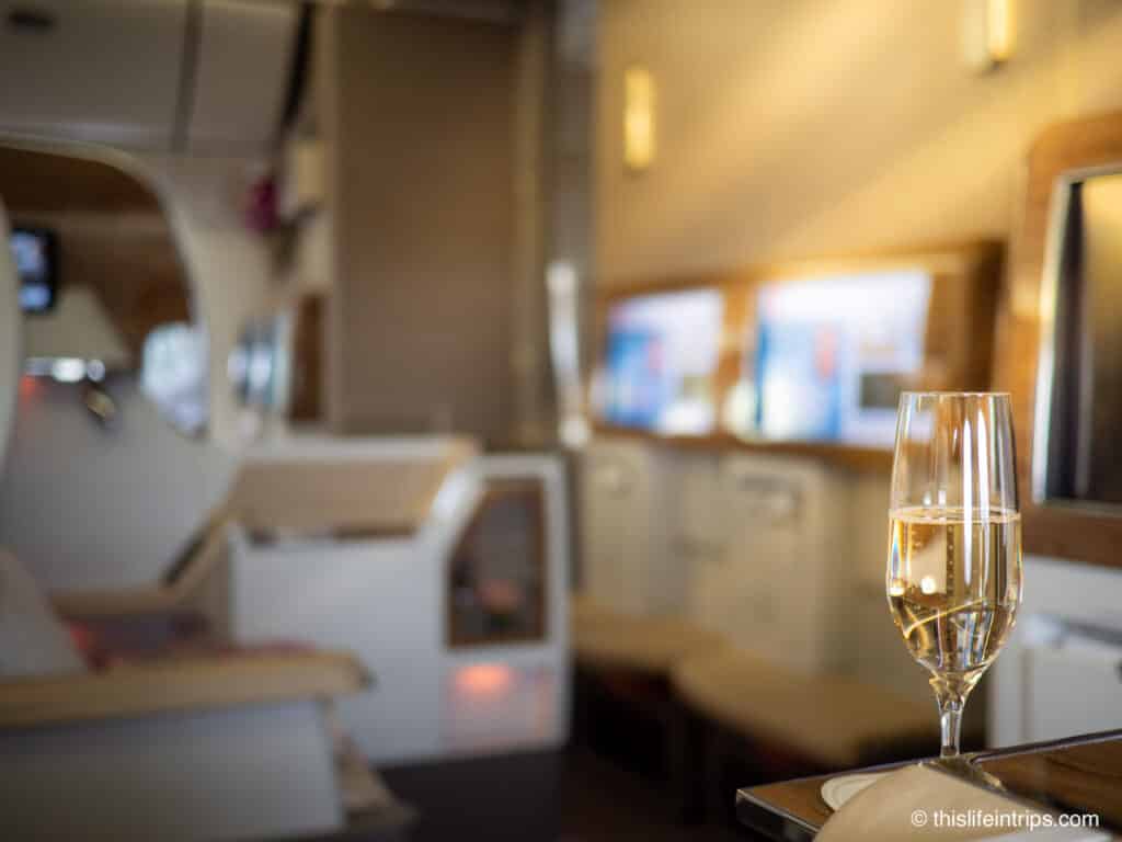 Glass of champagne on an Emirates 777 business class flight