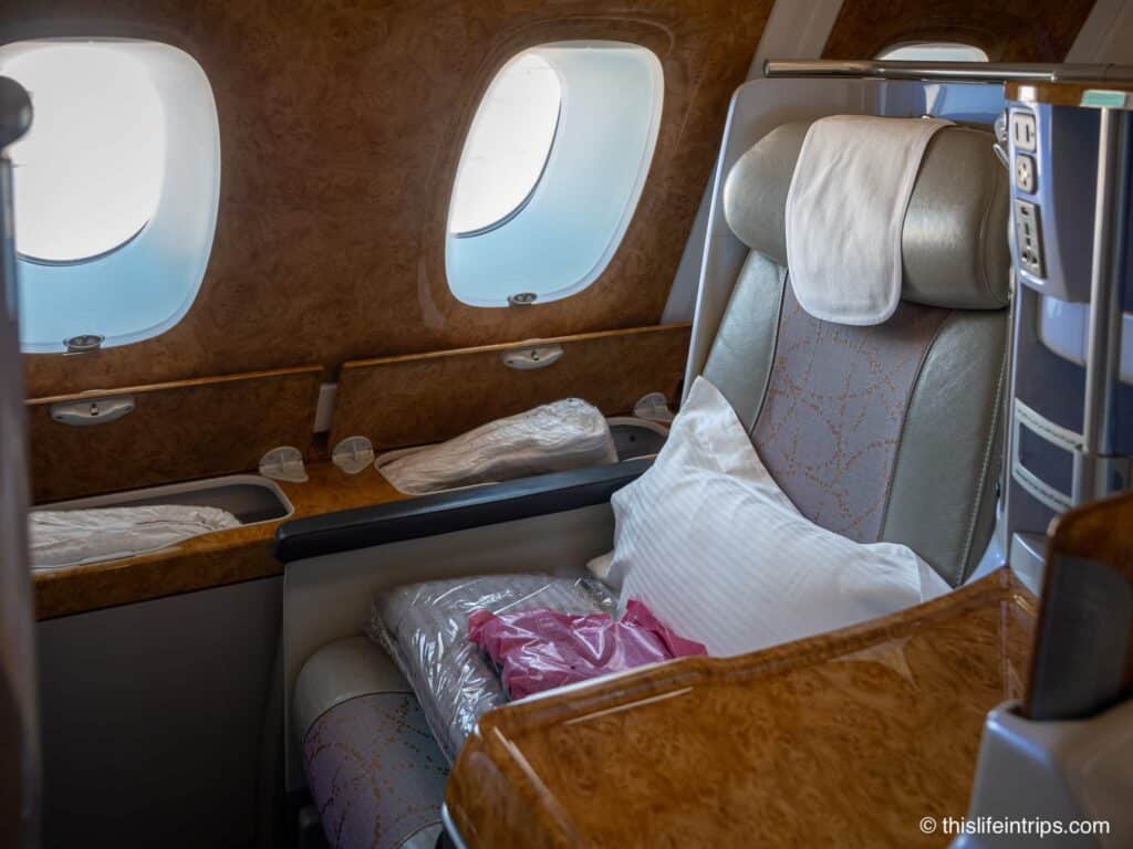 A380 emirates business class review - photo of seat along window