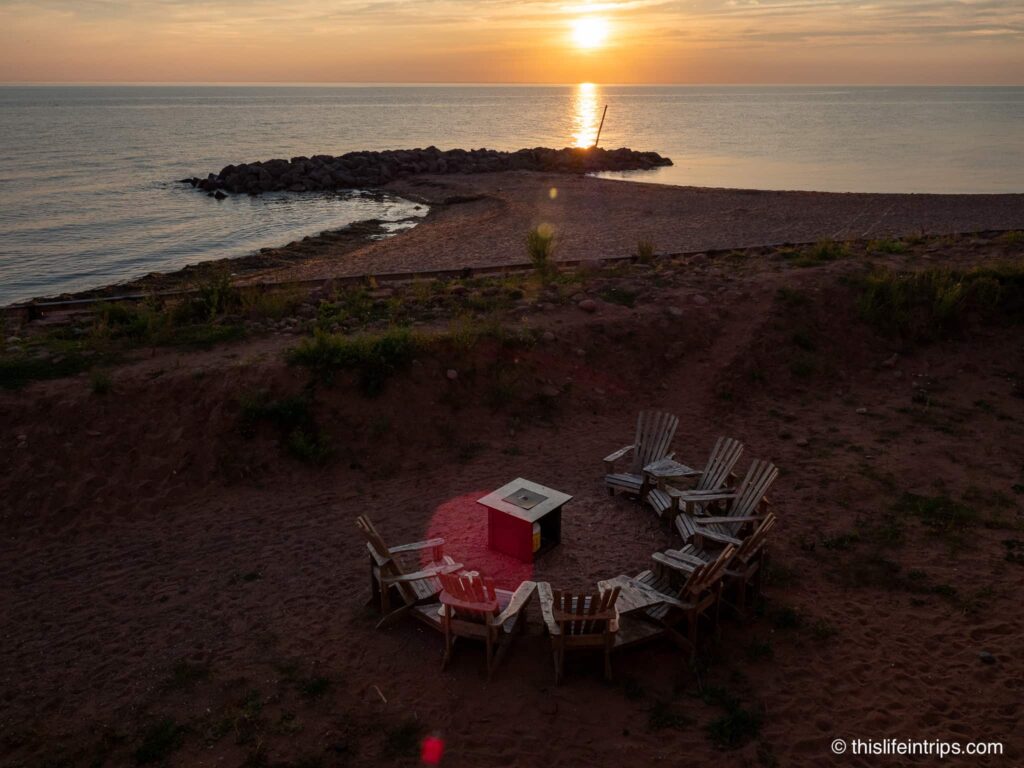Sunset and firepit at the West Point Lighthouse Inn