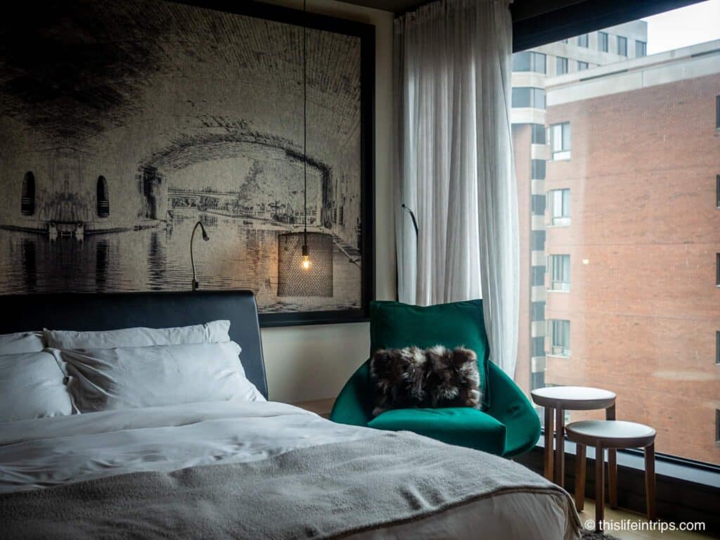 Plush bedding and amenities at Le Germain Ottawa