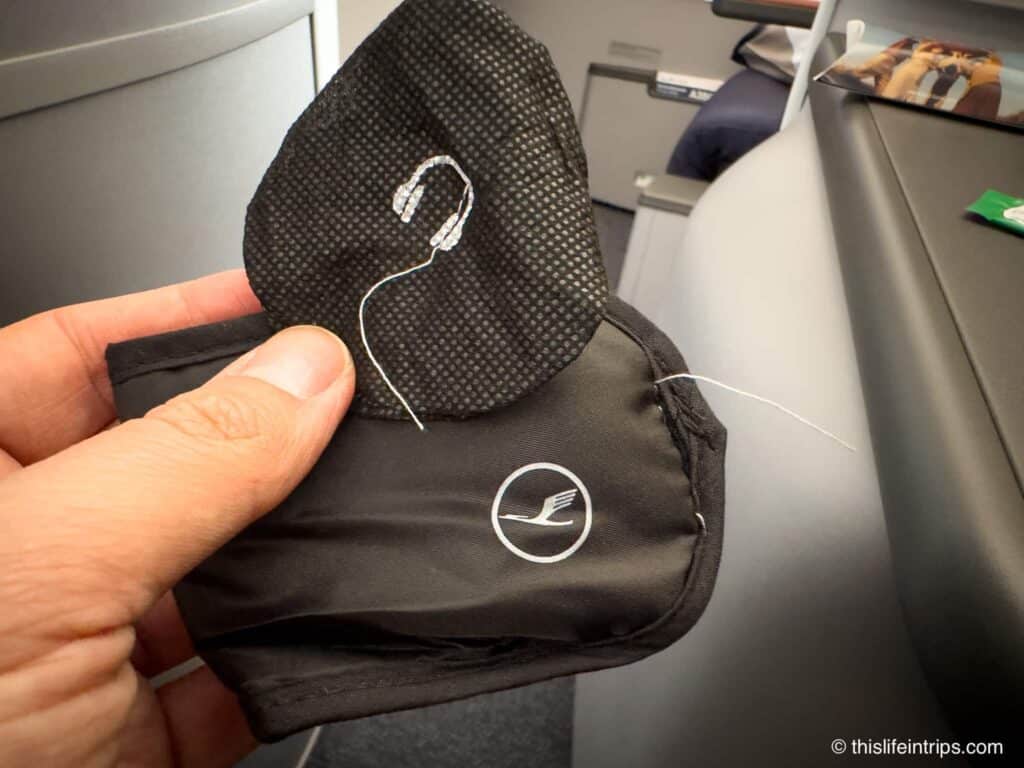 Lufthansa Allegris business class amenity kit eye mask and earphone covers