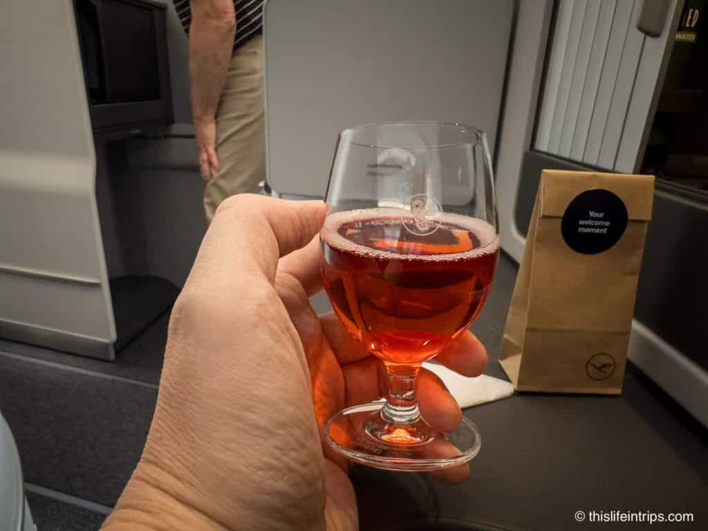 Welcome drink on Lufthansa Allegris business class