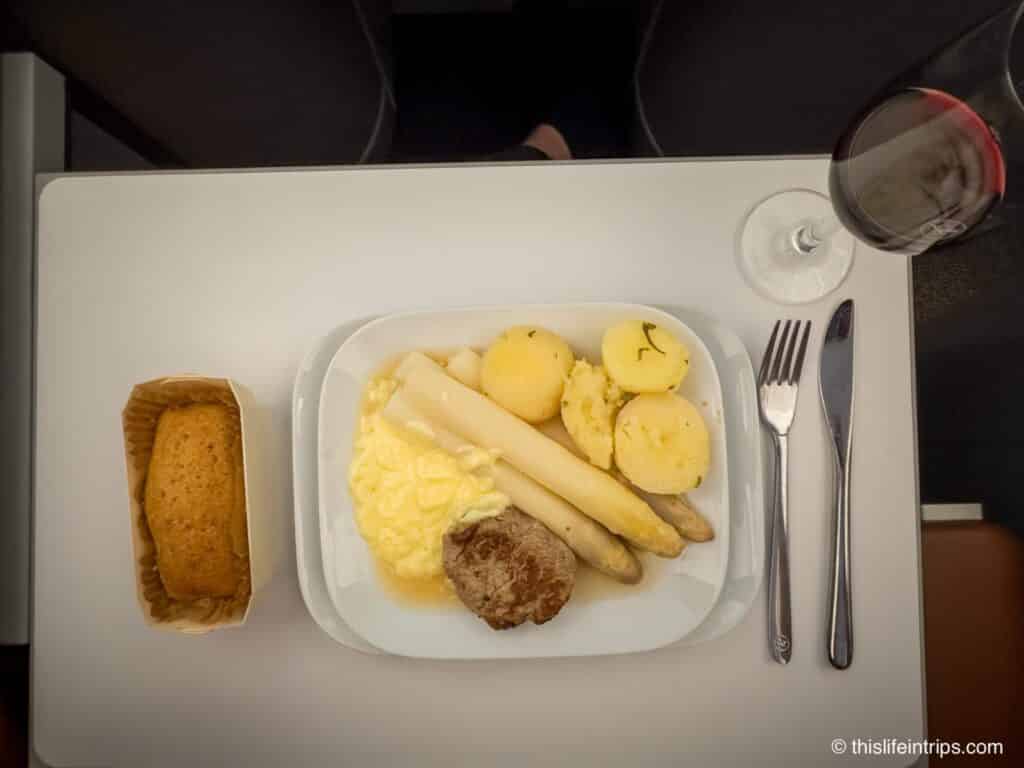 Lufthansa Allegris business class meal - veal and white asparagus with hollandaise sauce