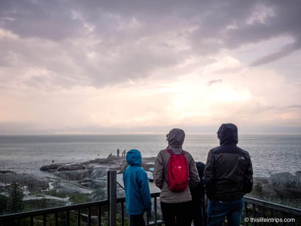 Family Taking in the views from the Cap-de-Bon-Désir Interpretation and Observation Centre