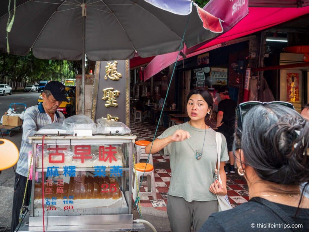 Tina, my Taipei food tour guide sharing her local knowledge
