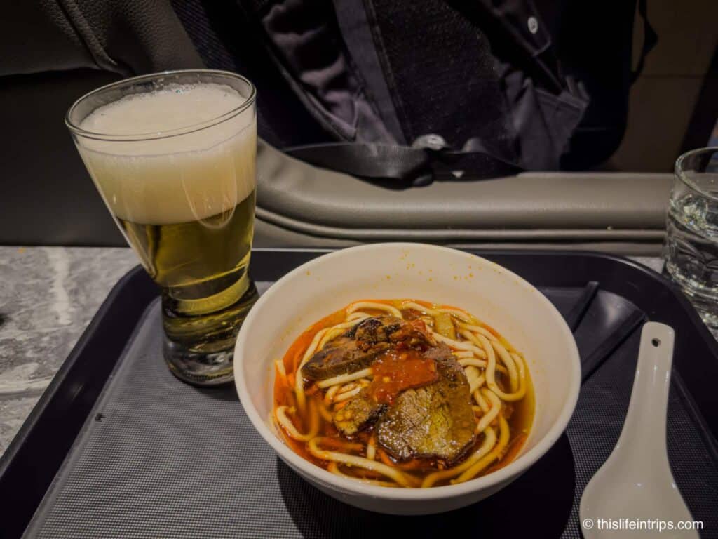 Beef noodle soup and beer from the Kitchen at the Premium Lounge Taipei Terminal 1 location