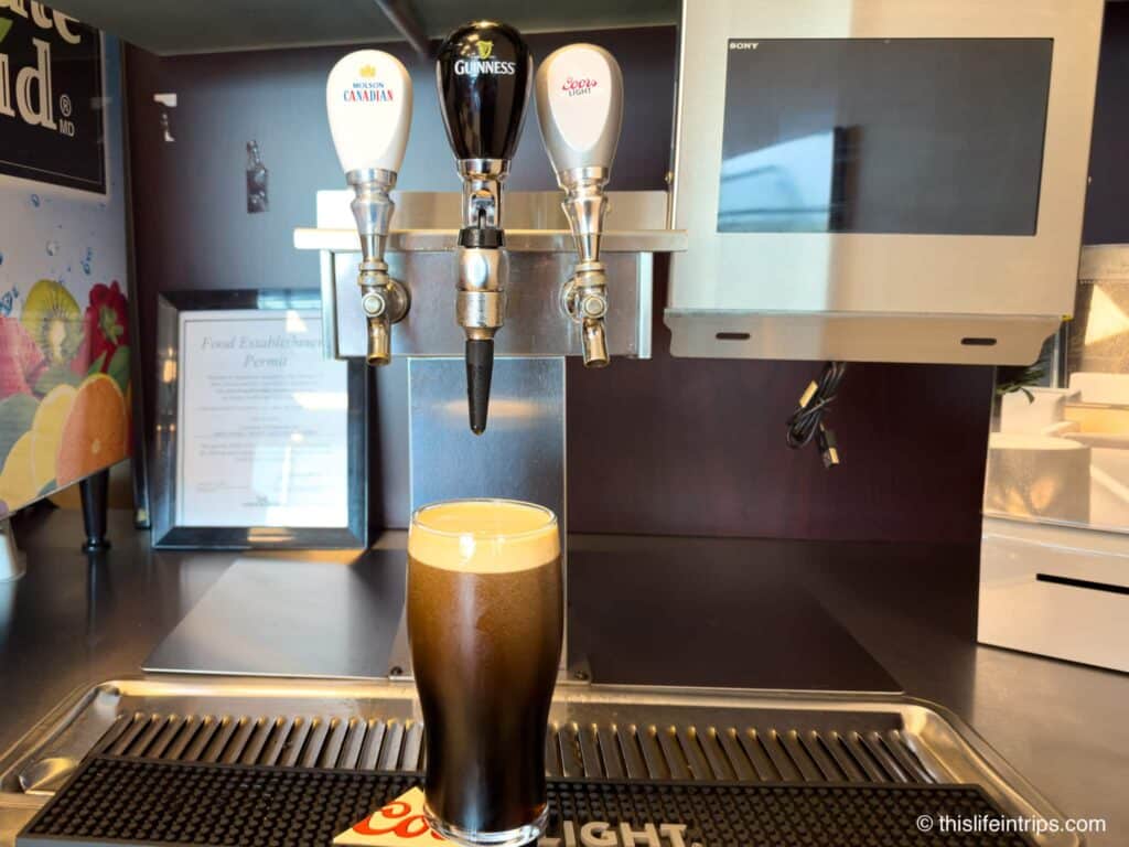 Pint of Guinness being poured at the Air Canada lounge Halifax