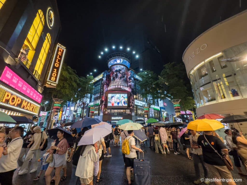 Crowd with umbrellas at Ximending, Taipei