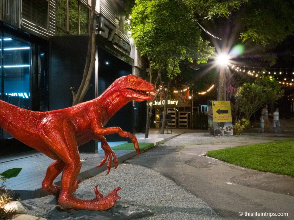 Red raptor sculptor at Changchun Creative Park in Bangkok