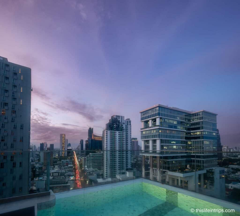 Rooftop pool at night at Staybridge Suites Bangkok Thonglor