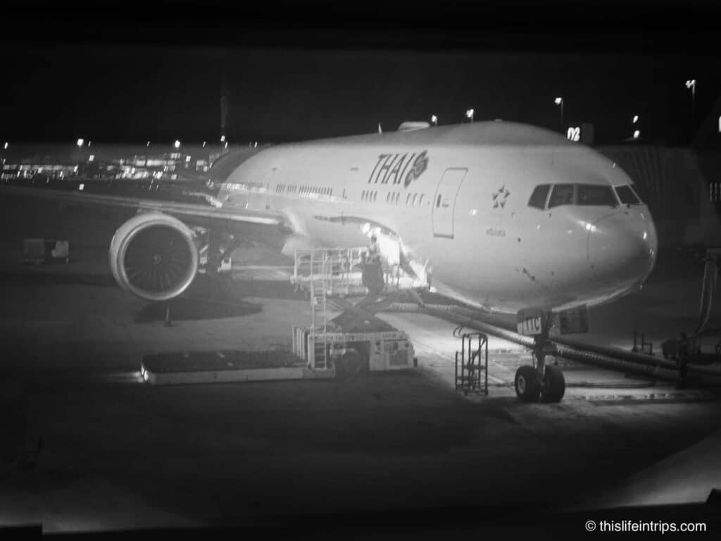 Boeing 777-300ER Thai Airways parked at BKK gate