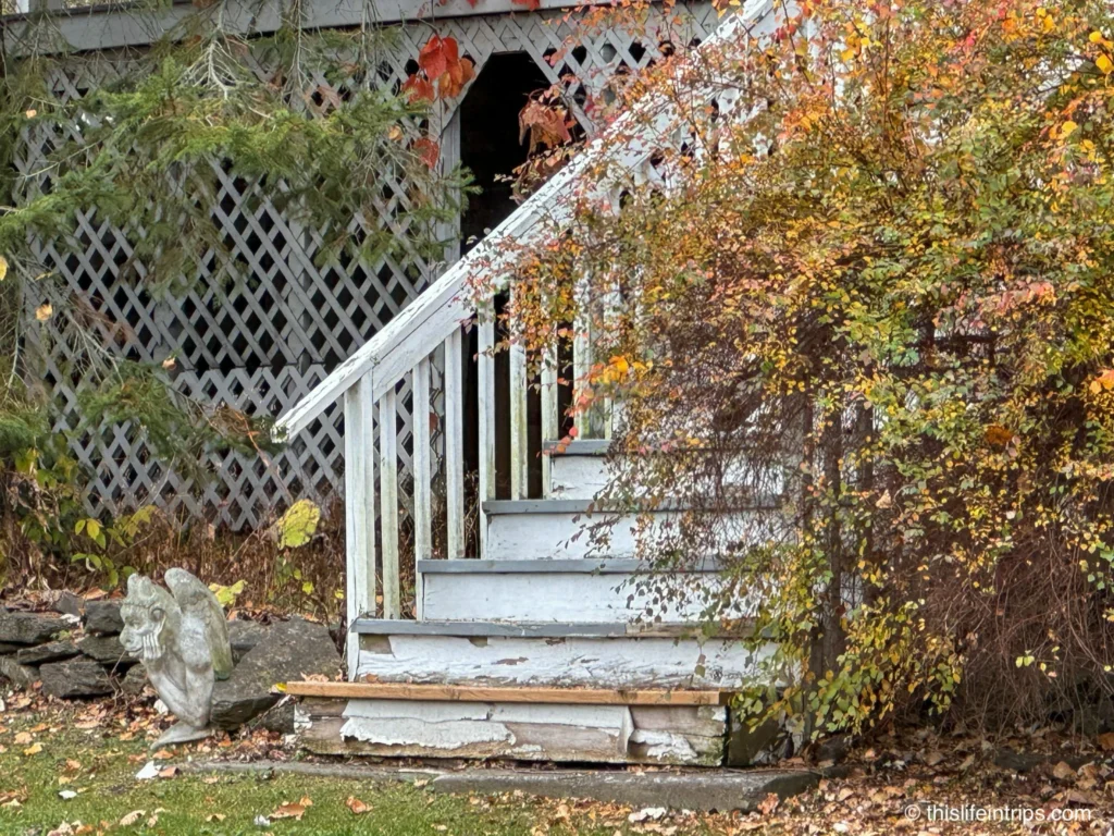 Gargoyle at the Bathouse Studio steps, Bath, Ontario