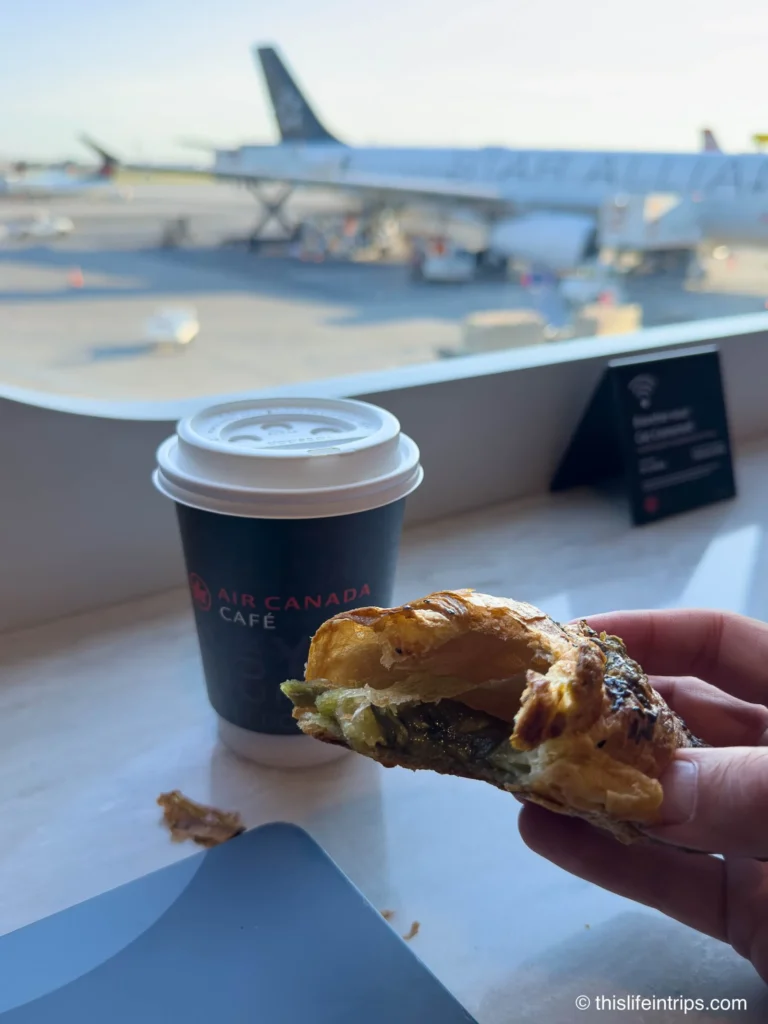 A warm and flaky pistachio croissant at the YUL Air Canada Cafe