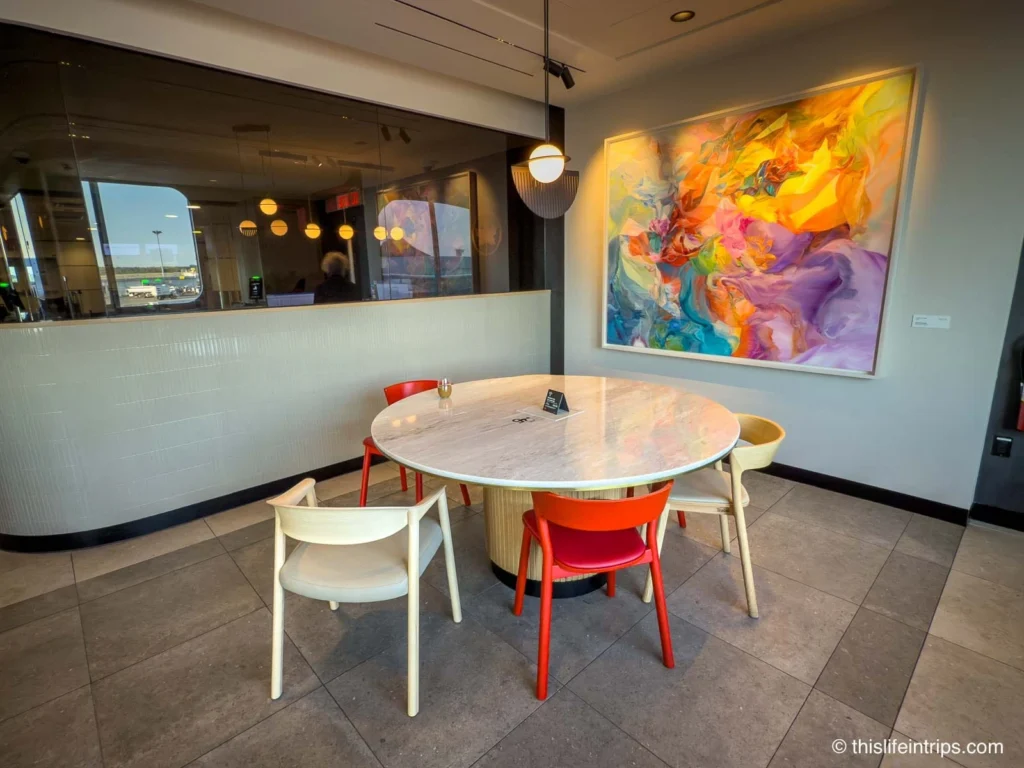 A lone round table at the Montreal Air Canada Cafe