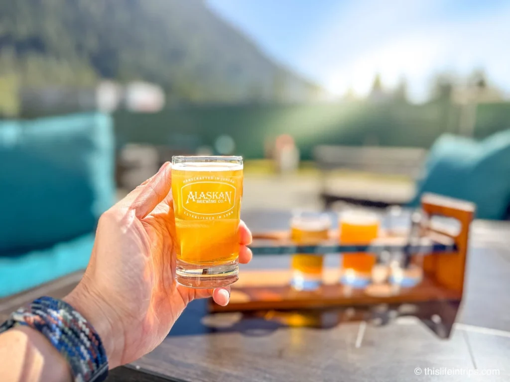 Alaska Brewing pint in hand - one of the best things to do in Juneau