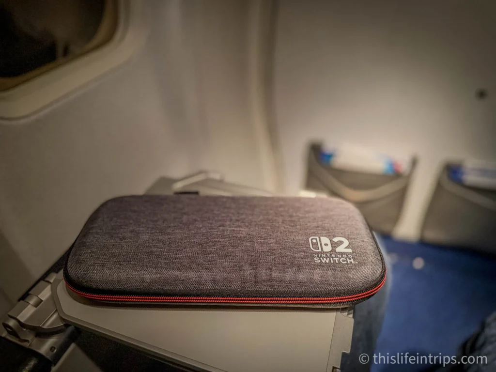 Nintendo Switch travel case on a flight
