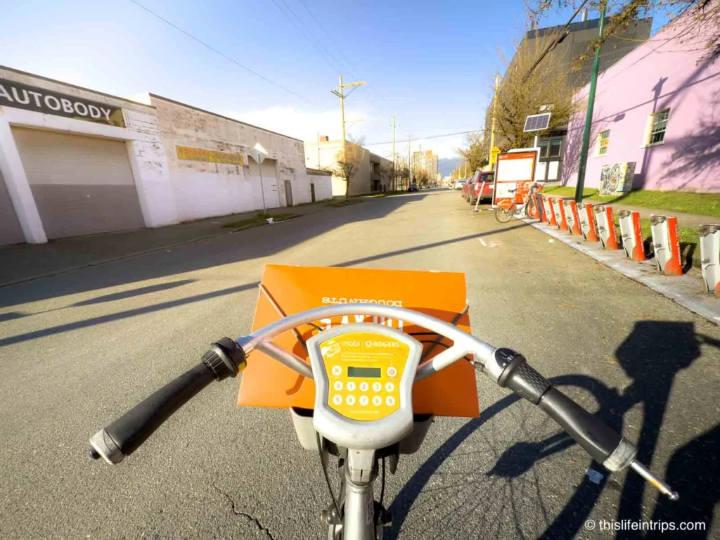 Donuts to go strapped to a Mobi bike in Vancouver